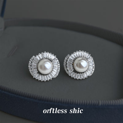 Silver pearl double halo baguette CZ studs on gray tray