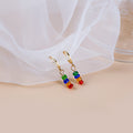 Gold Huggie Hoop Earrings With Multicolor Glass Bead Drops view 2