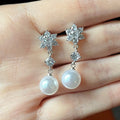 Silver Tone Snowflake White Pearl Look Drop Earrings view 3