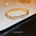 Gold Tone Hinged Bangle With Triple Rows Of Clear Crystals view 3