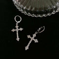 Silver Tone Crystal Cross Dangle Huggie Earrings with Decorative Accents view 6