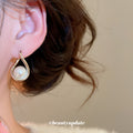 Open Frame Pearl Hoop Earrings with Distinctive Textured Details view 3