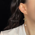 Gold Tone Butterfly Long Chain White Pearl Like Hook Earrings view 2