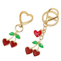 Gold Heart Clasp Charm Keychain With Bow Cherry Accent view 5