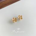 Gold Five Petal Flower Huggie Earrings Clear Center Stone view 4