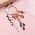 Guitar, Piano and Music Note Charm Keychains Featuring Red Piano Across 25 Variations view 2