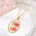 Gold Tone Oval Resin Pressed Flower Pendant Necklaces in Six Colors view 2