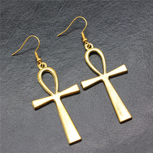 Front display of ankh earrings on a light background