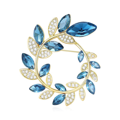 Front view of marquise Crystal Leaf Wreath Brooch in Blue Pink or Green against a white background.