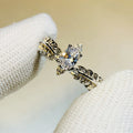 Silver-Tone Feather Band Ring with a Marquise Clear Stone view 4