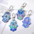 Silver Tone Printed Hamsa Acrylic Clip Keychains in Five Designs view 1