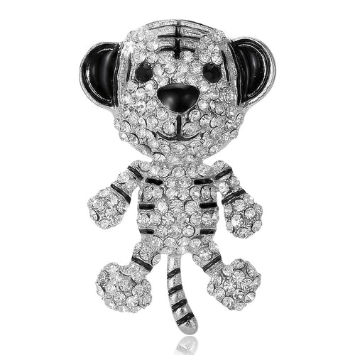 Silver tone clear rhinestone tiger brooch standing upright
