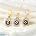 Gold Tone Crystal Teardrop Evil Eye Necklace and Earring Options view 4