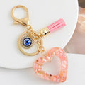 Resin Chip Heart Charm Keychain with Evil Eye Rhinestone and Tassel Accent view 3