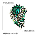 Oval Gem Feather Brooch In Eight Colorways With Polished Metal Detail view 9