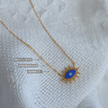 Blue Evil Eye Pendant Necklace Gold Spiked Frame Chain view 2