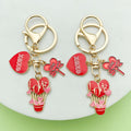 Heart Charm Keychains Featuring Red Heart Across 35 Pictured Variations view 2