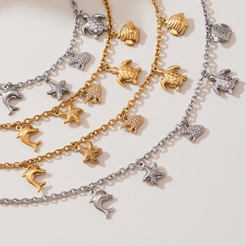 Marine Crystal Charm Necklace and Bracelet in Two Finishes