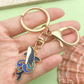 Starfish, Shell and Mermaid Charm Keychains Featuring Blue Whale Across 36 Variations view 1