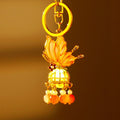 Illuminated Orange Plume Keychain With Pearl and Bead Tassels view 2