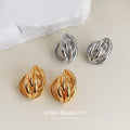 Intertwined Hollow Geometric Stud Earrings Silver and Gold view 2