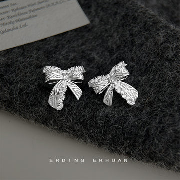Silver Tone Crystal Pave Bow Stud Earrings Engraved Texture