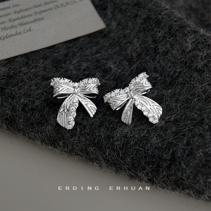 Silver Tone Crystal Pave Bow Stud Earrings Engraved Texture