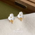 White Enamel Flower Stud Earrings Gold Leaf Accent Pair view 4
