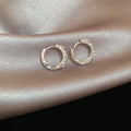 Crystal Huggie Hoop Earrings in Silver and Gold Tone Finishes view 6