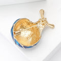 Round Spiral Shell Enamel Snail Brooch in Blue and Orange view 3
