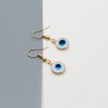 Gold Tone White and Blue Evil Eye Drop Earrings with Hooks view 2