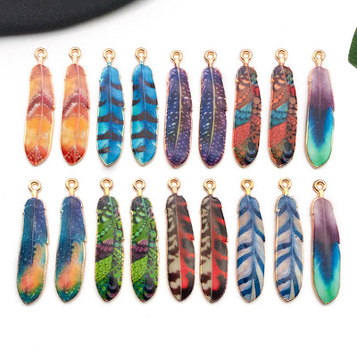 Colorful insect charms arranged on a light background
