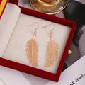 Gold Black Rose Gold and Silver Open Feather Hook Earrings view 3