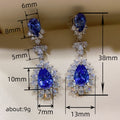 Deep Blue Oval And Pear Floral Halo Long Earrings In Silver Tone view 5