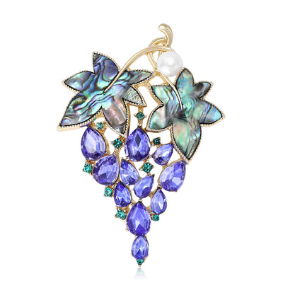 Front view of the purple grape cluster brooch with iridescent shell leaves brooch and its color options
