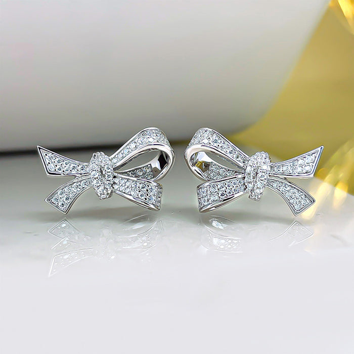 Silver Bow Pavé Stud Earrings In A Polished Decorative Design