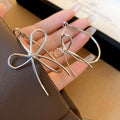 Wire Bow Hoop Earrings in Gold and Silver Tone, Three Styles view 7