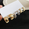 Twisted C Hoop Earrings in Mixed Gold and Silver Tones view 6
