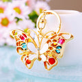 Colorful Openwork Butterfly Keychain with White Enamel and Gold Tone Frame view 1