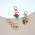 Gold Tone Pressed Flower Heart Resin Clip Keychains view 1