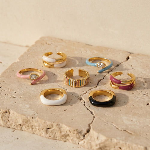 Grouped style view of colorful enamel and crystal open rings in main image 2.