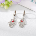 Gold and Silver Tone Pavé Crystal Hamsa Evil Eye Huggie Earrings view 10