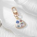 Gold Tone Evil Eye Printed Shell-Look Lobster-Clasp Charms in Six Designs view 2