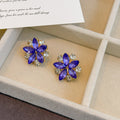 Purple Six Petal Clear Accent Flower Stud Earrings view 3