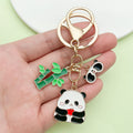 Panda Charm Keychains Featuring White Flower Across 45 Pictured Variations view 3