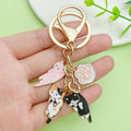 Cat Charm Keychains Featuring Angel Across 24 Pictured Variations view 2
