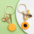 Bee and Honeycomb Charm Keychains Featuring Bee Across 25 Pictured Variations view 3