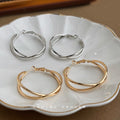 Twisted Double Band Large Hoop Earrings Silver and Gold view 1