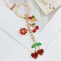 Gold Heart Clasp Charm Keychain With Bow Cherry Accent view 6