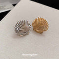 Ridged Seashell Metal Single Ear Clips in Gold and Silver view 4